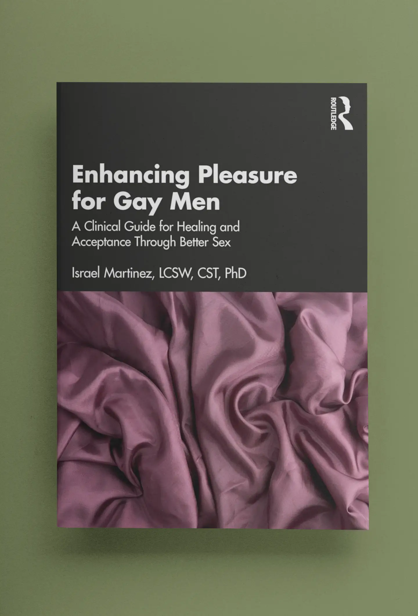 Enhancing Pleasure for Gay Men paperback book on a satin surface